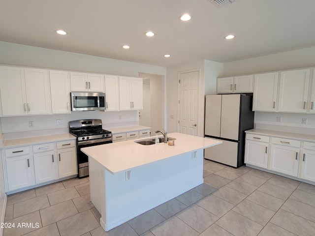 kitchen featuring white cabinetry, sink, and stainless steel appliances