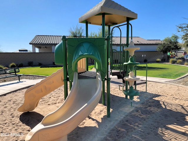 view of jungle gym featuring a yard