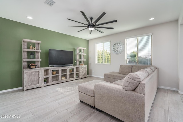 living room with ceiling fan