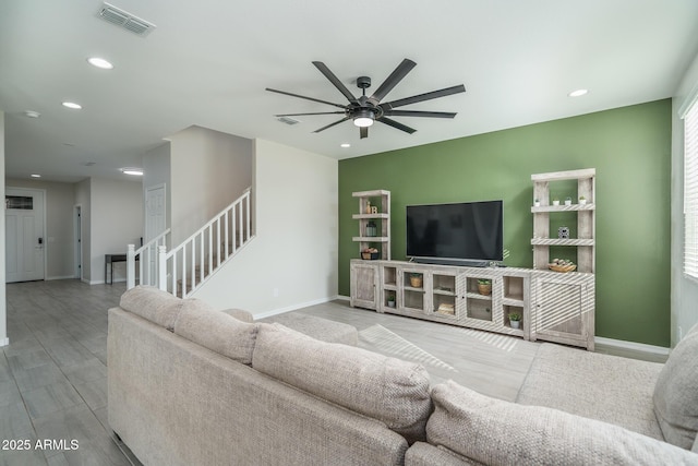 living room with ceiling fan