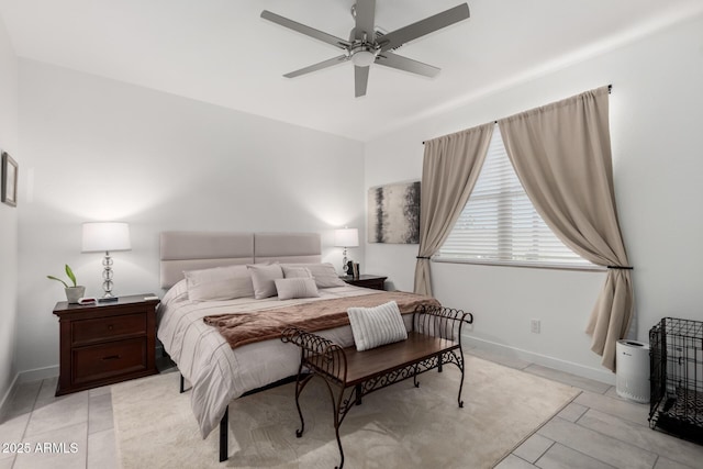3670 E Sandoval Dr, San Tan Valley, AZ 85140 - bedroom with light tile patterned flooring, baseboards, and ceiling fan
