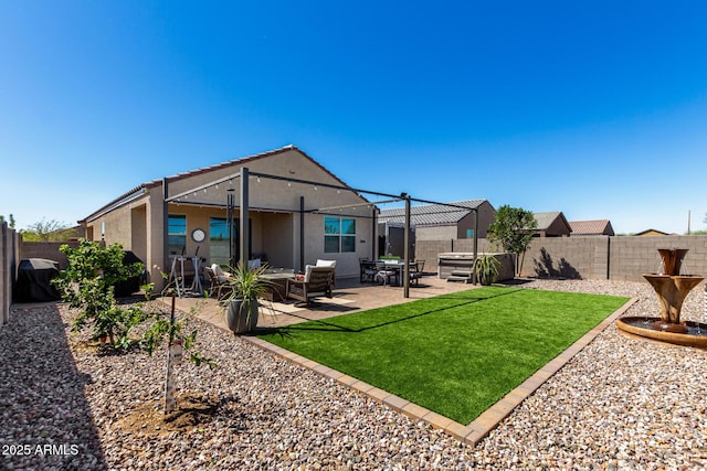 3670 E Sandoval Dr, San Tan Valley, AZ 85140 - back of property with a fenced backyard, a lawn, stucco siding, and a patio