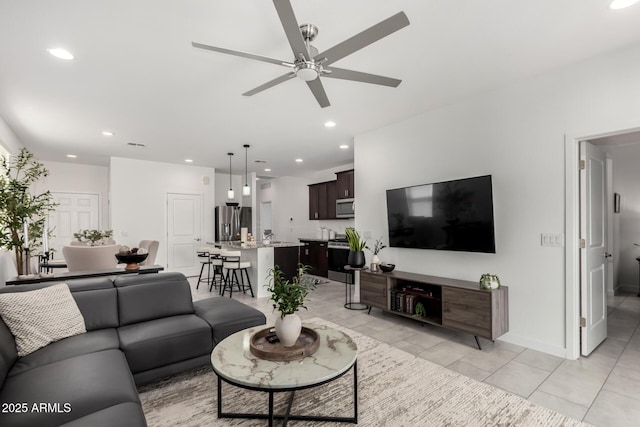 3670 E Sandoval Dr, San Tan Valley, AZ 85140 - living area featuring baseboards, ceiling fan, and recessed lighting