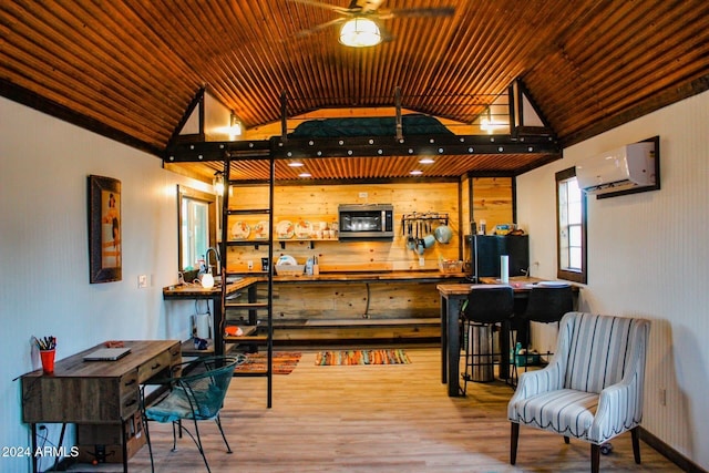 bar featuring vaulted ceiling, an AC wall unit, and wooden ceiling