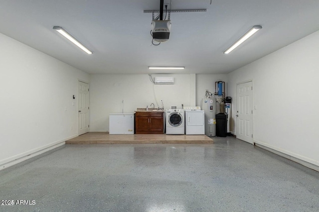 garage featuring a garage door opener, sink, a wall unit AC, independent washer and dryer, and water heater