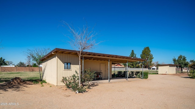 exterior space with a storage shed