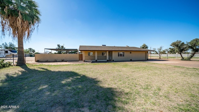 view of front facade featuring a garage and a front lawn