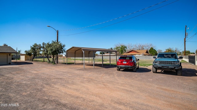 view of yard with a carport