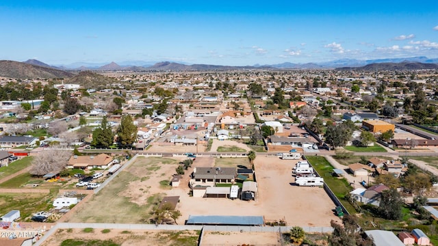 birds eye view of property featuring a mountain view