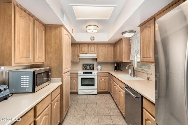 kitchen featuring stainless steel appliances and sink