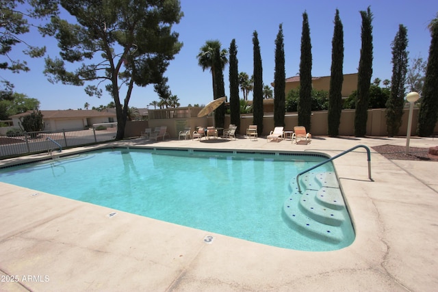 view of pool featuring a patio area