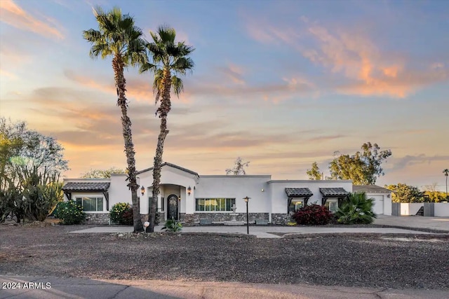 view of front of property featuring a garage