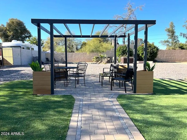 view of community with a pergola, a yard, a shed, and a patio area