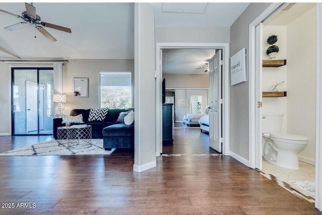 15252 N 100th St Unit 2157, Scottsdale, AZ 85260 - living room featuring a ceiling fan and wood finished floors