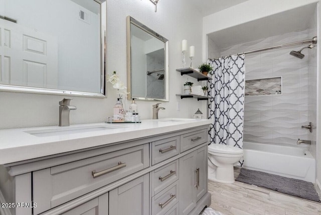15252 N 100th St Unit 2157, Scottsdale, AZ 85260 - bathroom featuring double vanity, shower / bath combo with shower curtain, toilet, and wood finished floors