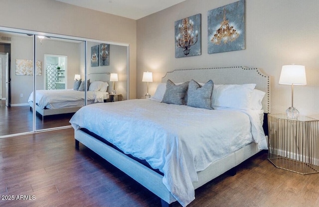 15252 N 100th St Unit 2157, Scottsdale, AZ 85260 - bedroom with wood finished floors and a closet