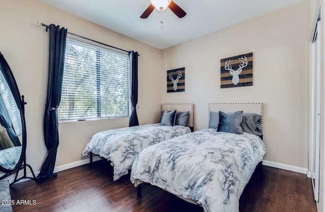 15252 N 100th St Unit 2157, Scottsdale, AZ 85260 - bedroom with baseboards, wood finished floors, and a ceiling fan
