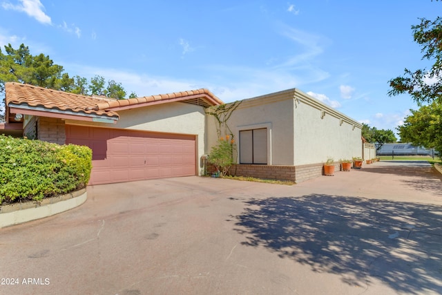 view of front of home with a garage