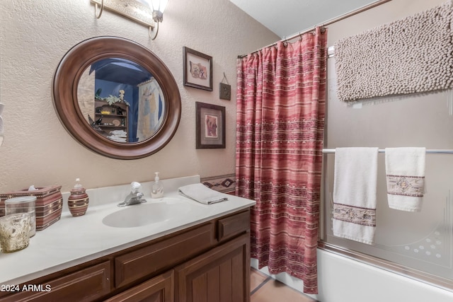 bathroom featuring vanity and shower / bath combo with shower curtain