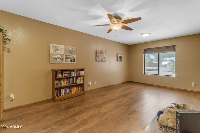 empty room featuring ceiling fan and light wood-type flooring