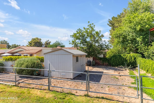 exterior space featuring a shed