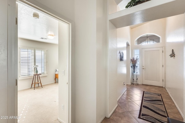 view of tiled foyer entrance