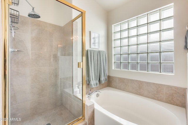 bathroom with independent shower and bath