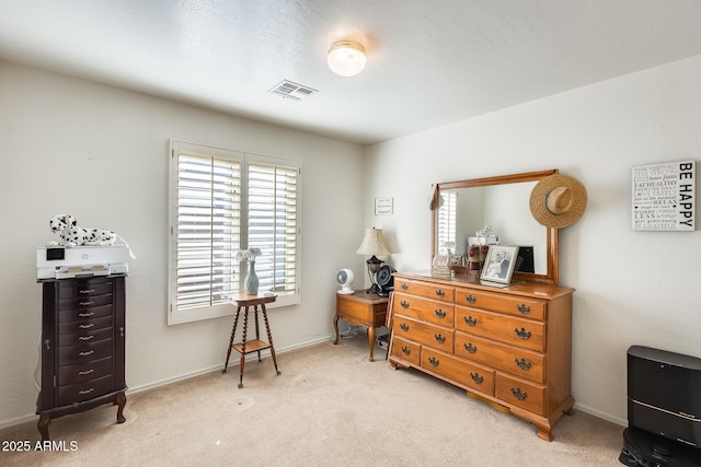 interior space featuring light carpet