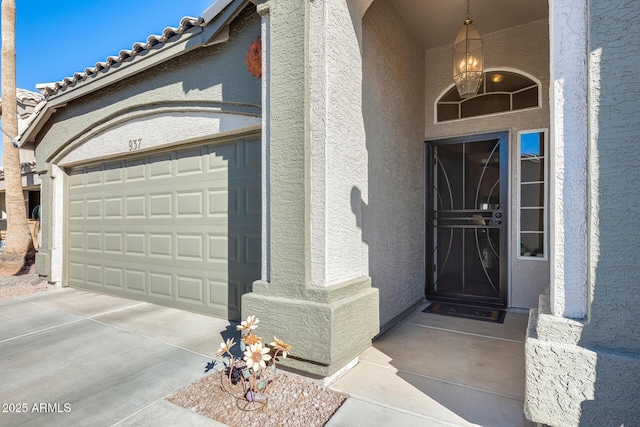 entrance to property featuring a garage