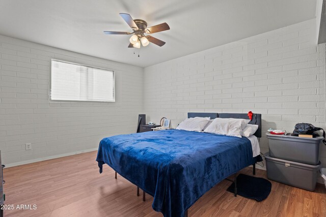 5802 N 61st Dr, Glendale, AZ 85301 - bedroom featuring wood finished floors, baseboards, and ceiling fan