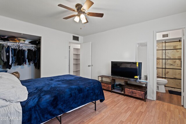 5802 N 61st Dr, Glendale, AZ 85301 - bedroom featuring wood finished floors, a closet, ensuite bathroom, and a ceiling fan