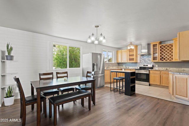 5802 N 61st Dr, Glendale, AZ 85301 - dining area with a chandelier and light wood-type flooring
