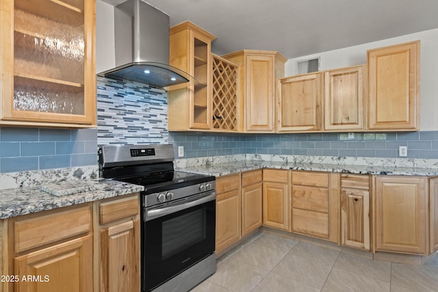 5802 N 61st Dr, Glendale, AZ 85301 - kitchen with stainless steel electric range, ventilation hood, light brown cabinets, light stone counters, and tasteful backsplash