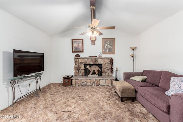 living room with lofted ceiling, carpet floors, a fireplace, and a ceiling fan