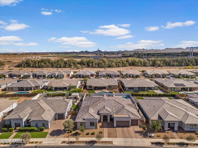 aerial view with a mountain view and a residential view