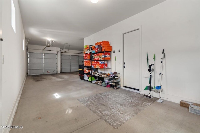 garage featuring baseboards