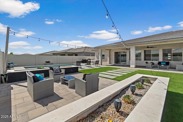 view of patio with ceiling fan, a fenced backyard, an outdoor hangout area, a fenced in pool, and a jacuzzi