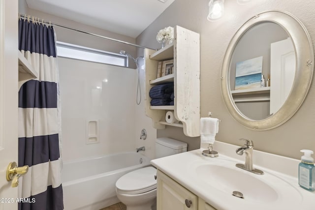 full bathroom with toilet, vanity, and shower / bath combination with curtain