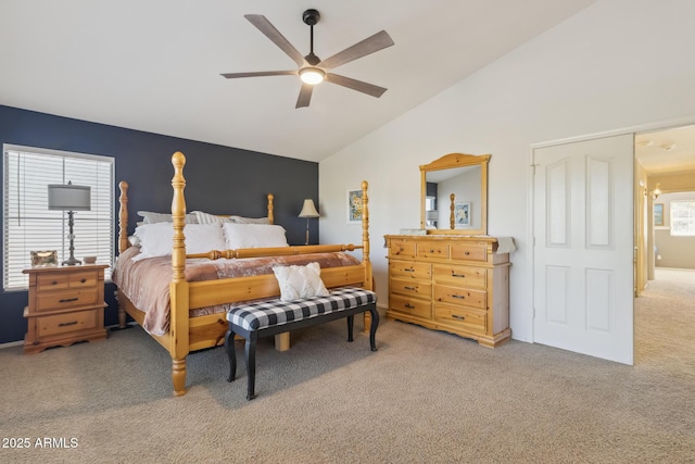 bedroom featuring carpet floors, a ceiling fan, and vaulted ceiling