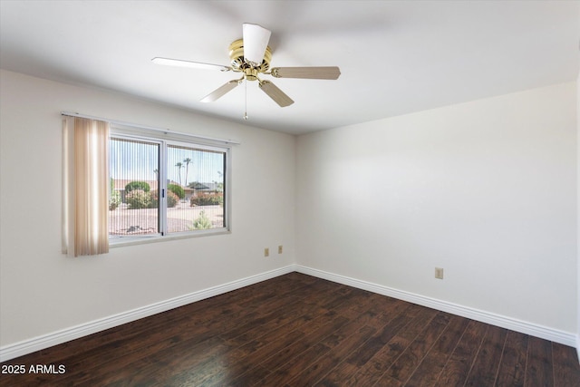 unfurnished room featuring ceiling fan and dark hardwood / wood-style floors