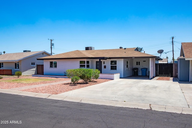 1011 W Weldon Ave, Phoenix, AZ 85013 - ranch-style house featuring fence and driveway