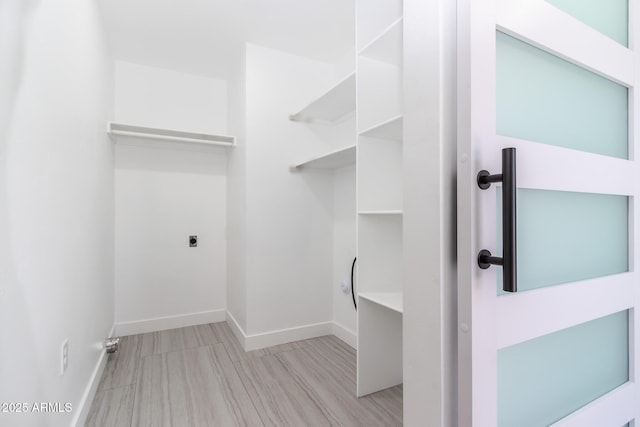 1011 W Weldon Ave, Phoenix, AZ 85013 - washroom with electric dryer hookup and baseboards