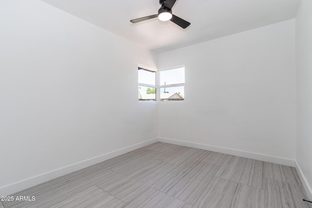 1011 W Weldon Ave, Phoenix, AZ 85013 - empty room with ceiling fan and baseboards