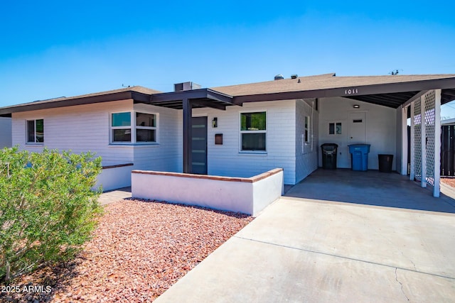 1011 W Weldon Ave, Phoenix, AZ 85013 - ranch-style house featuring a carport and concrete driveway