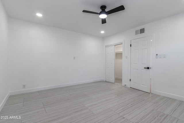 1011 W Weldon Ave, Phoenix, AZ 85013 - unfurnished bedroom with baseboards, a closet, recessed lighting, and ceiling fan