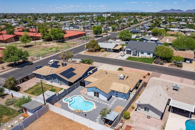1011 W Weldon Ave, Phoenix, AZ 85013 - aerial perspective of suburban area featuring a pool area and a mountain backdrop
