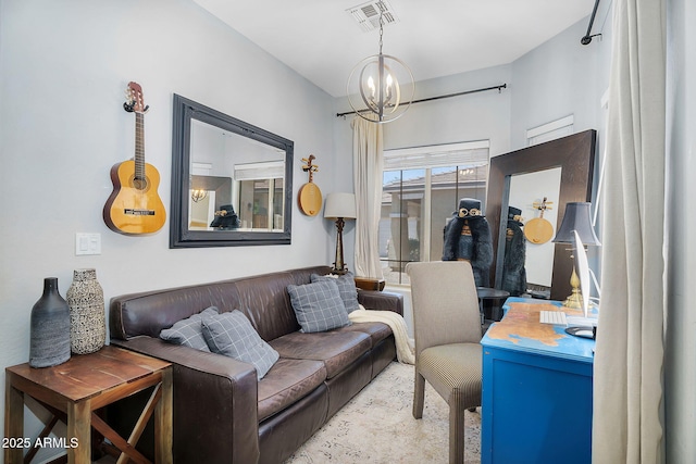 948 E Savannah Dr, Chandler, AZ 85225 - living area featuring a chandelier