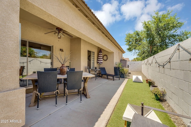 948 E Savannah Dr, Chandler, AZ 85225 - fenced backyard featuring a patio, ceiling fan, and outdoor dining area