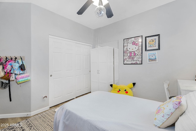 948 E Savannah Dr, Chandler, AZ 85225 - bedroom featuring a closet, wood finished floors, ceiling fan, and baseboards
