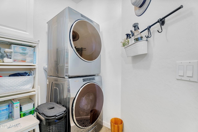 948 E Savannah Dr, Chandler, AZ 85225 - laundry room featuring stacked washing machine and dryer and baseboards
